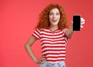 Woman showing her phone