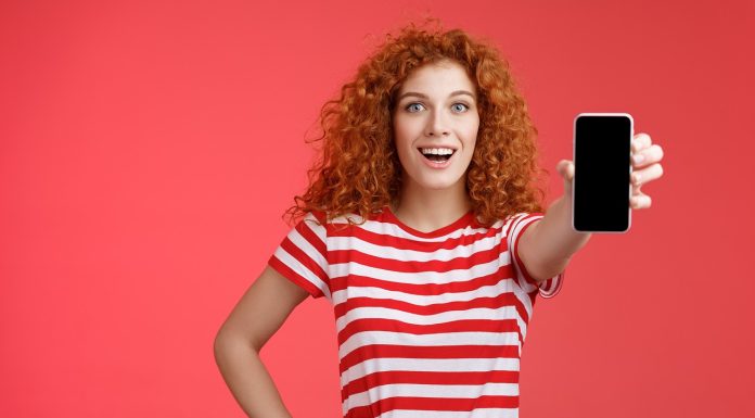 Woman showing her phone