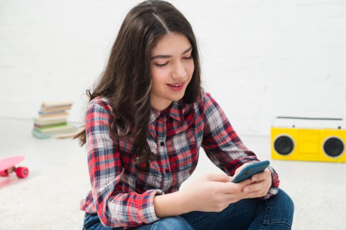 girl with cellphone girl with cellphone