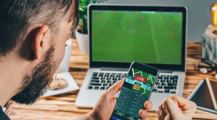 Gambling using mobile phone and computer