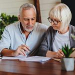 Mature couple with financial documents