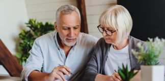 Mature couple with financial documents