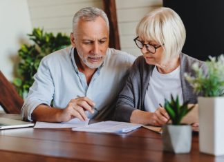 Mature couple with financial documents
