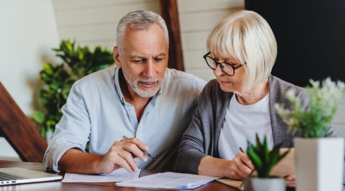 Mature couple with financial documents