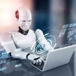 Meet Genie: The AI-Powered ‘Agent-Building Agent’ by Olas Core Contributor, Valory AI robot using laptop