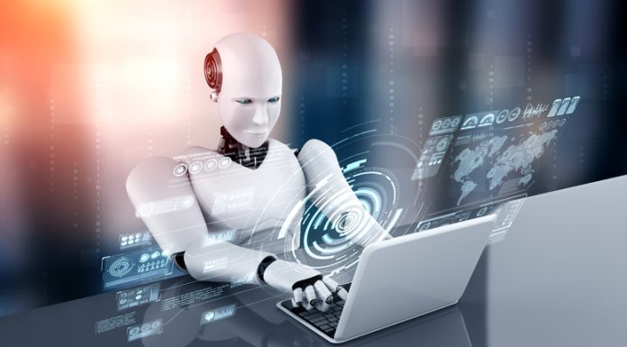 AI robot using laptop