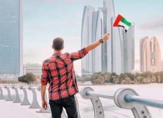 Resident in Dubai holding a flag