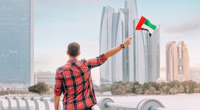 Resident in Dubai holding a flag