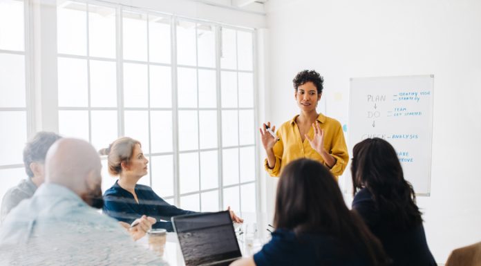 Female leader having a meeting with colleagues