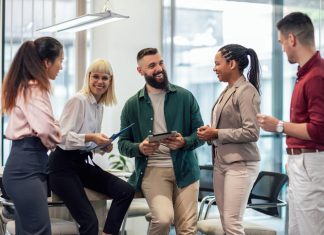 Debunking Two Common Myths About Psychological Safety Employees having fun during a discussion