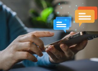 Release the Potential of Online SMS: Transforming Corporate Communications Person using smartphone for conversation