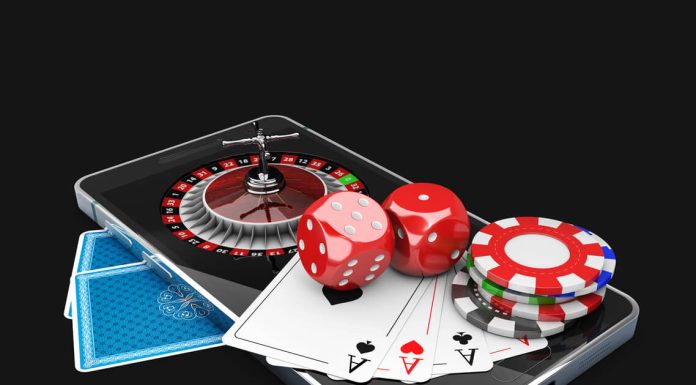 3d Illustration of Mobile phone with Roulette, play card, dice and chips. Online casino concept