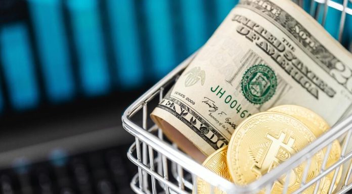 Gold Bitcoin Coins and Cash in a Miniature Shopping Cart