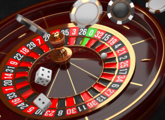Luxury Casino roulette wheel on black background. Casino theme.