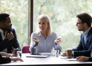 Being a Woman in the Director Position in the Public Sector: A Recruiters Perspective for the Public Sector  Mature leader boss give helpful information to young professionals