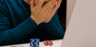 Man playing with his computer on gambling websites