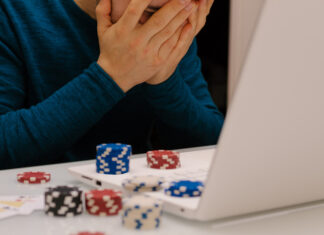 Man playing with his computer on gambling websites