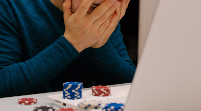 Man playing with his computer on gambling websites