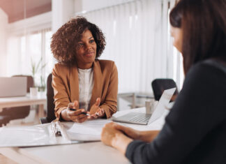 Young woman doing a job interview in the office