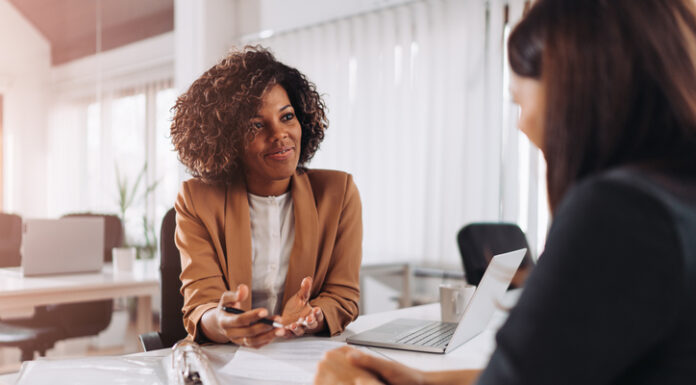 Young woman doing a job interview in the office