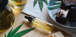 Exploring the Various Methods of Consuming Marijuana Food and drink and cannabis oil on the dining table. Alternative medicine concept.