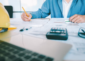 Architect or engineer working in office