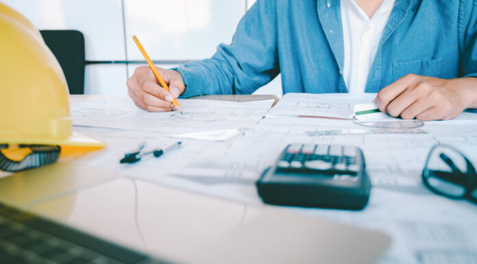 Architect or engineer working in office