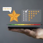 How to Read and Analyze Online Casino Reviews Smartphone screen with gold five star rating feedback