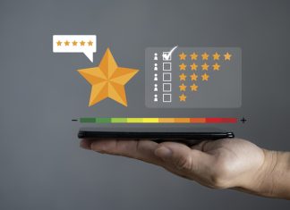 Smartphone screen with gold five star rating feedback