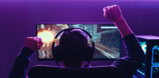Gamer wearing headset while playing