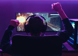 Gamer wearing headset while playing