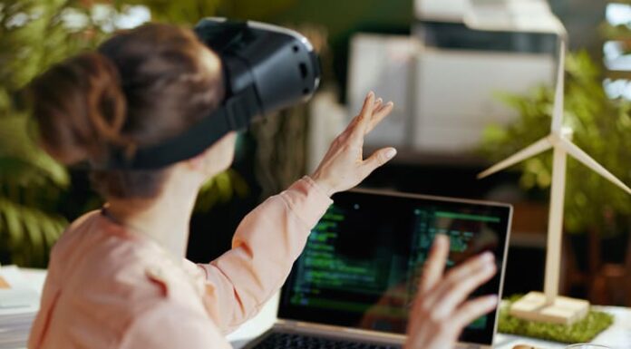 Female with laptop and vr gear in modern office