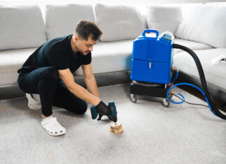 Cleaning the carpet at home using drill and brush