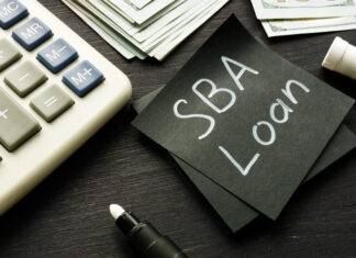 SBA loan handwritten memo on the calculator