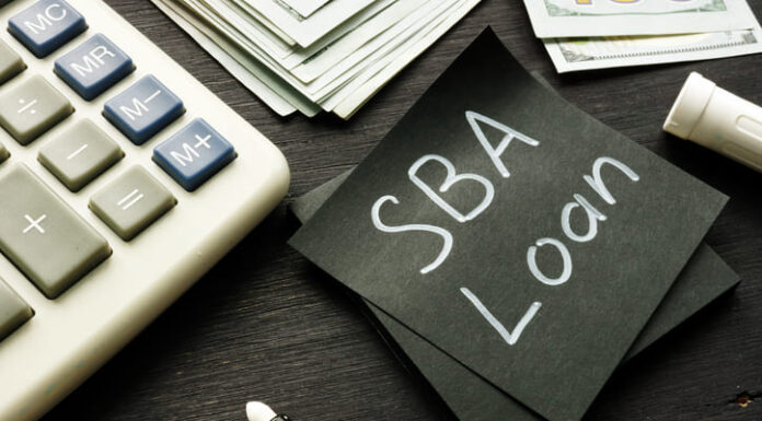 Guide to Choosing Small Business Loans in Florida SBA loan handwritten memo on the calculator