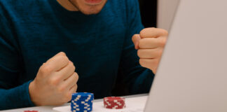 The Psychology of Winning: How Mindset Shapes Your Success in Online Gambling Gamer man playing with his laptop from home to casino games