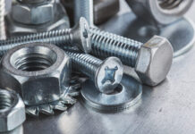 Exploring DIN 912 Screws: Design, Functionality, and Industrial Applications Set of different nuts, bolts, screws, washers and drill bits