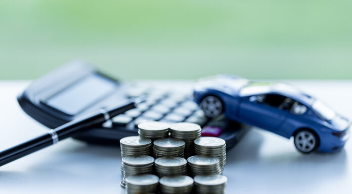 coins stack, car and calculator