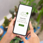 Guide to Account Verification for BC Game App Users Hand using smartphone and mobile OTP secure verification