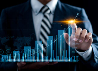 Businessman touching analyzing economic growth, business growth and strategy.