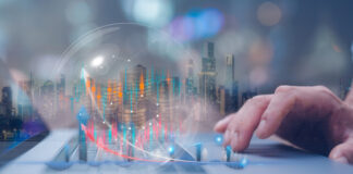 Exploring New, Modern Investment Opportunities Businessman using computer working at virtual trading graph