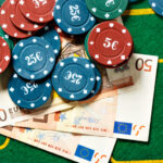Is The European Gambling Market Still On Track For Further Growth Poker chips and bills at a poker table
