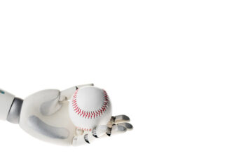 Robot hand holding white baseball ball isolated on white