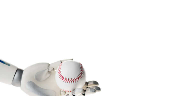 Robot hand holding white baseball ball isolated on white