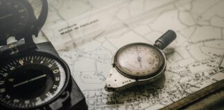 10 Steps to Navigating the Singapore Property Market for Europeans Black and Silver Compasses on Top of Map