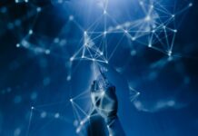 Professional Headshot Photographer vs. AI Headshot Generator: Which Is Better For Your Bank? Robot Pointing on a Wall