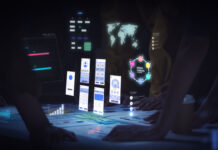 Mobile App Perks: A must for your Business Growth UI designer use augmented reality app brainstorming about mobile interface wireframe design on desk at night in office