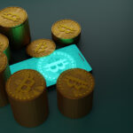 What Newcomers Need to Know When Playing in Crypto Casinos? Bitcoin cryptocurrency with pile of coins and smartphone