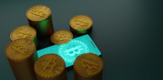 What Newcomers Need to Know When Playing in Crypto Casinos? Bitcoin cryptocurrency with pile of coins and smartphone