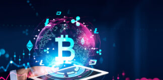 How to Choose the Best White Label Crypto Exchange Software for Your Business Man hand holding tablet. Screen and cryptocurrency hud hologram with bitcoin and graphs